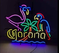 corona neon sign with flamingos and palm trees